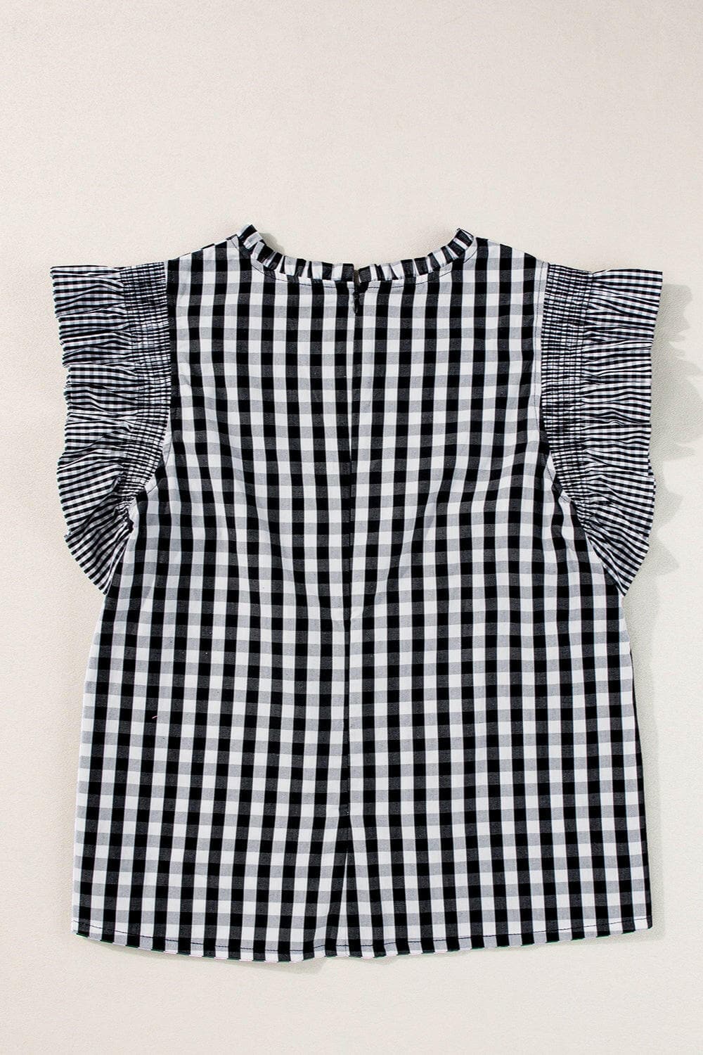 Ruffled Plaid Mock Neck Cap Sleeve Blouse.