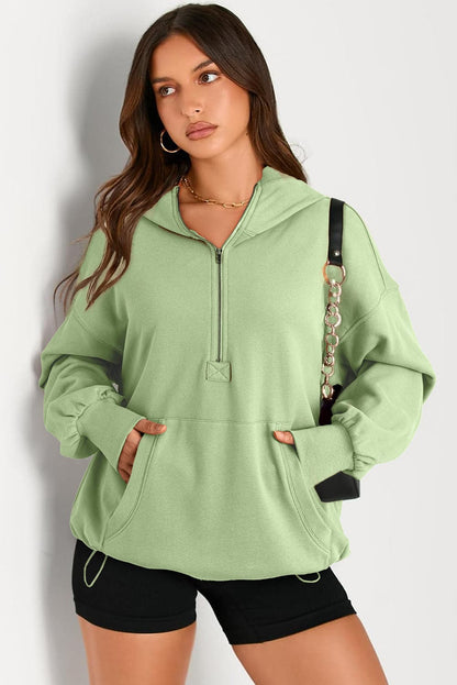 Sheer pocketed half zip hoodie for a stylish look