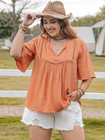 Plus Size Ruched Tie Neck Half Sleeve Blouse.