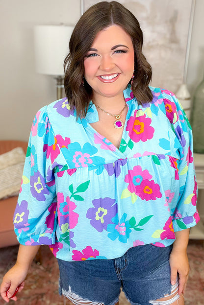 Light Blue Floral Print Plus Size Babydoll Blouse with Notched V Neck