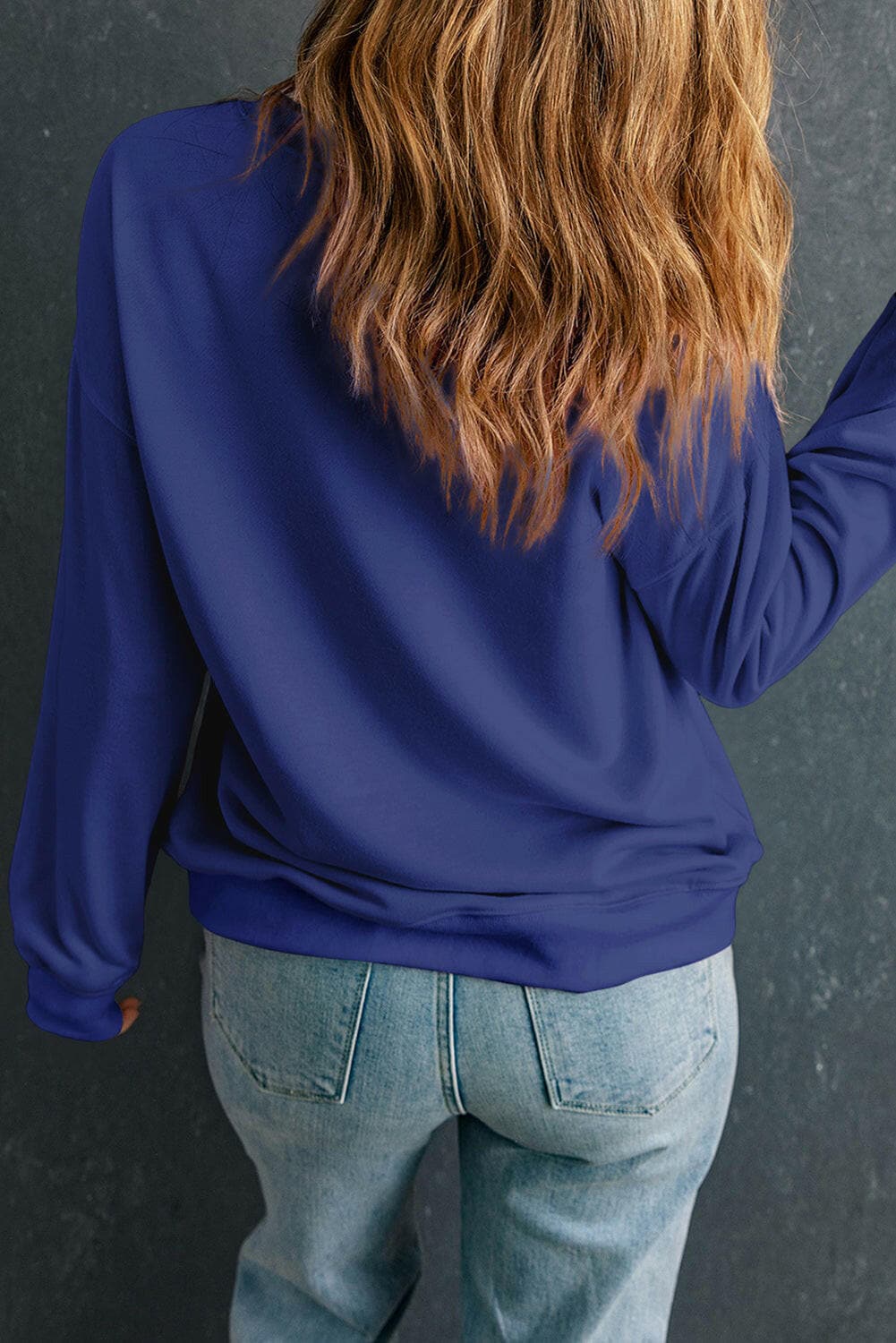 Round Neck Dropped Shoulder Sweatshirt.