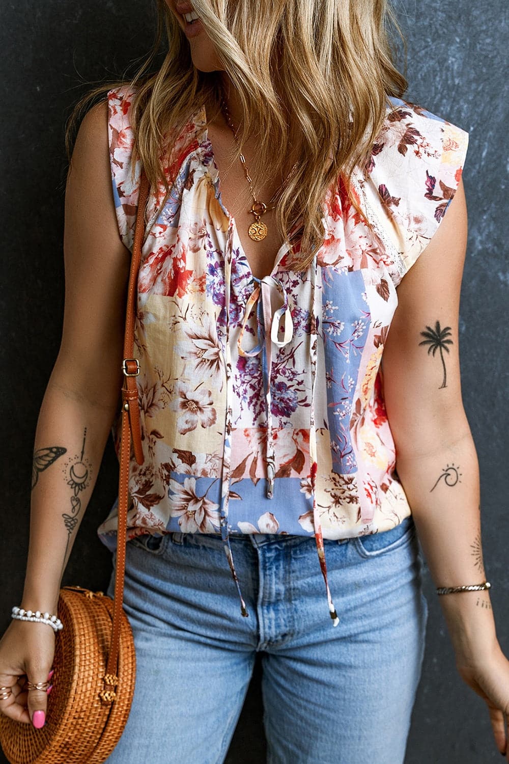 Printed Tie Neck Cap Sleeve Blouse.