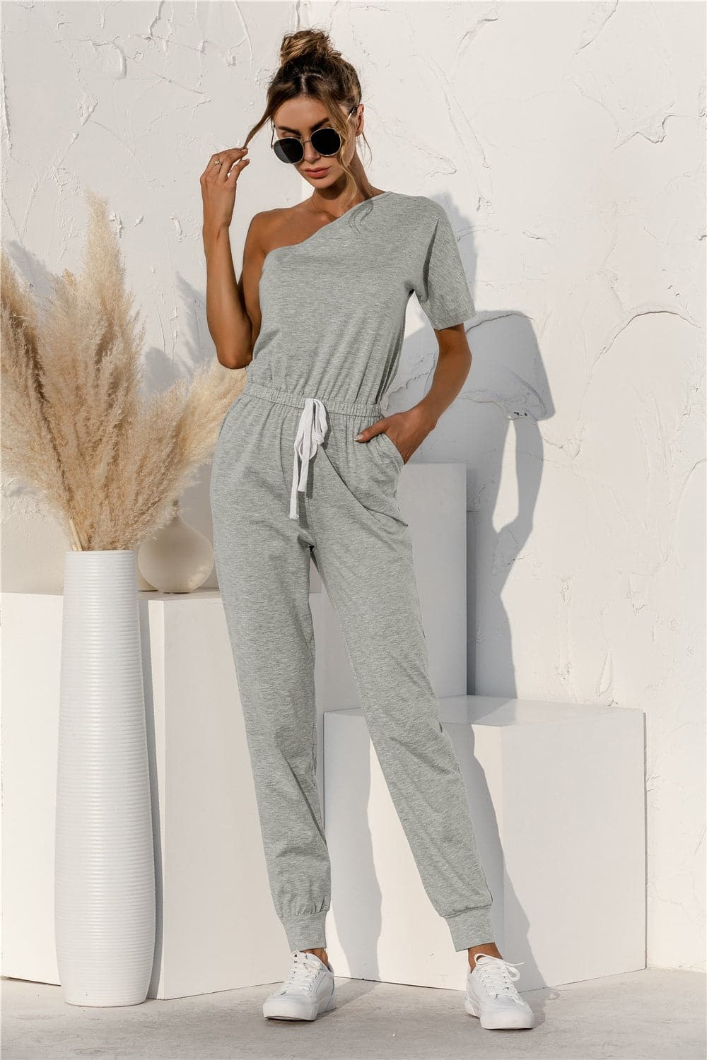 Single Shoulder Short Sleeve Jumpsuit.