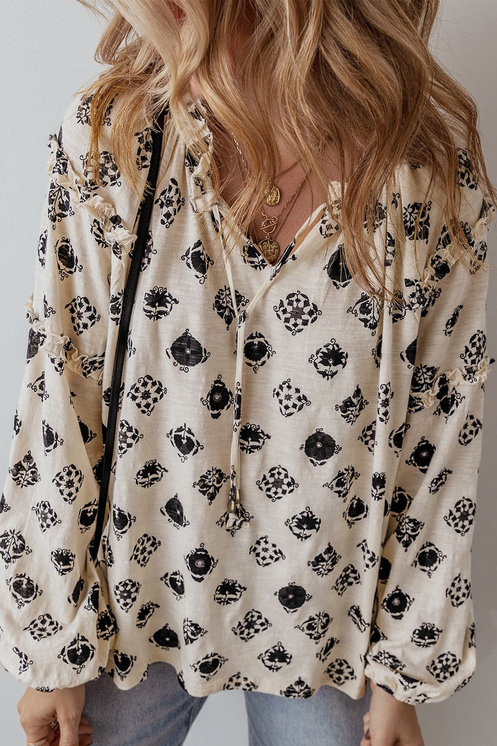 Frill Printed Tie Neck Long Sleeve Blouse.