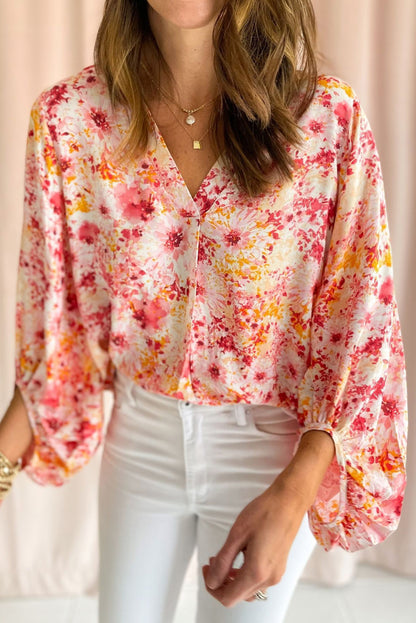 Charming pink floral v-neck blouse with bubble sleeves