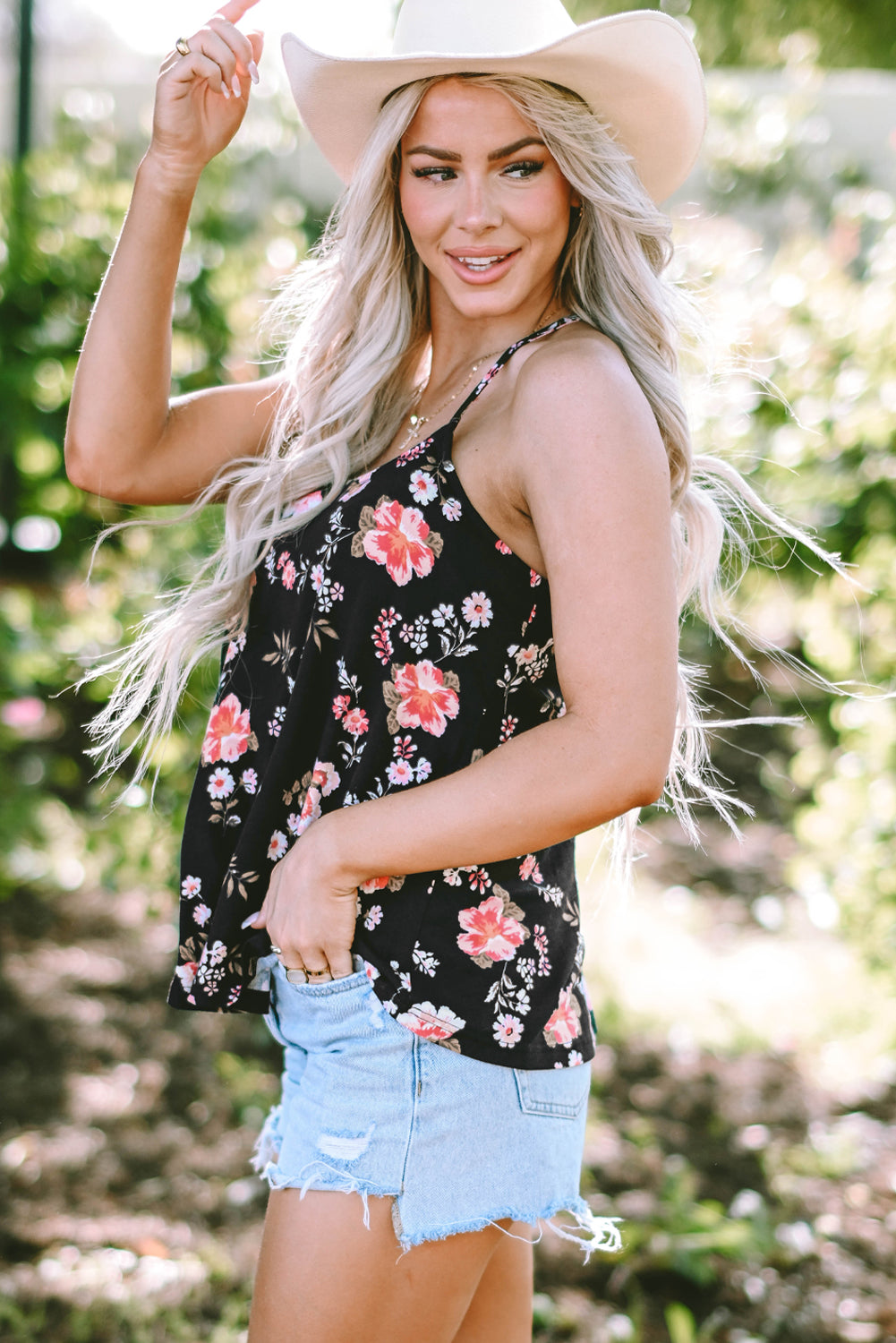 Chic black floral strappy tank top with daring back design