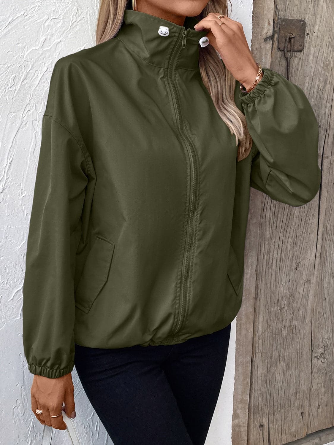 Pocketed Zip Up Long Sleeve Jacket.