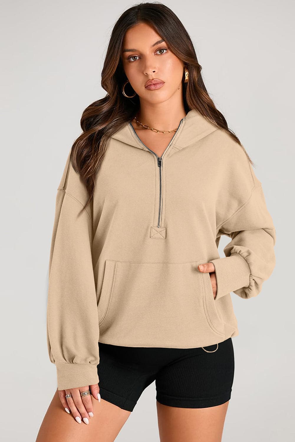 Sheer pocketed half zip hoodie for a stylish look