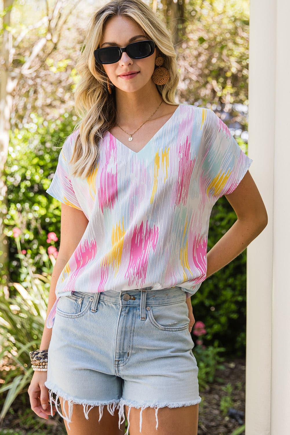 High-Low V-Neck Short Sleeve Blouse.