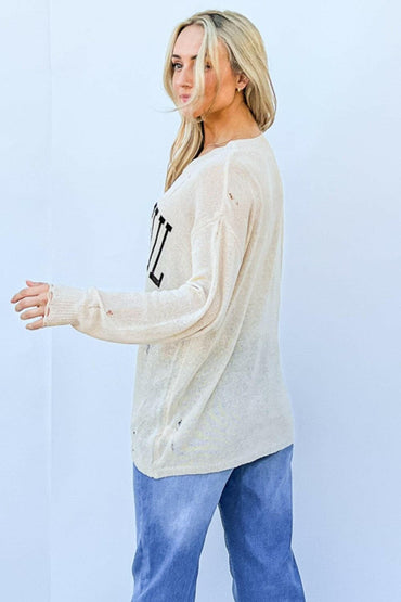 And The Why GRATEFUL Long Sleeve Knit TopStay Chic and Cozy with the GRATEFUL Long Sleeve Knit Top
 The GRATEFUL Long Sleeve Knit Top is your perfect companion for effortless style this season. Crafted fromLove Salve GRATEFUL Long Sleeve Knit Topjust arrived