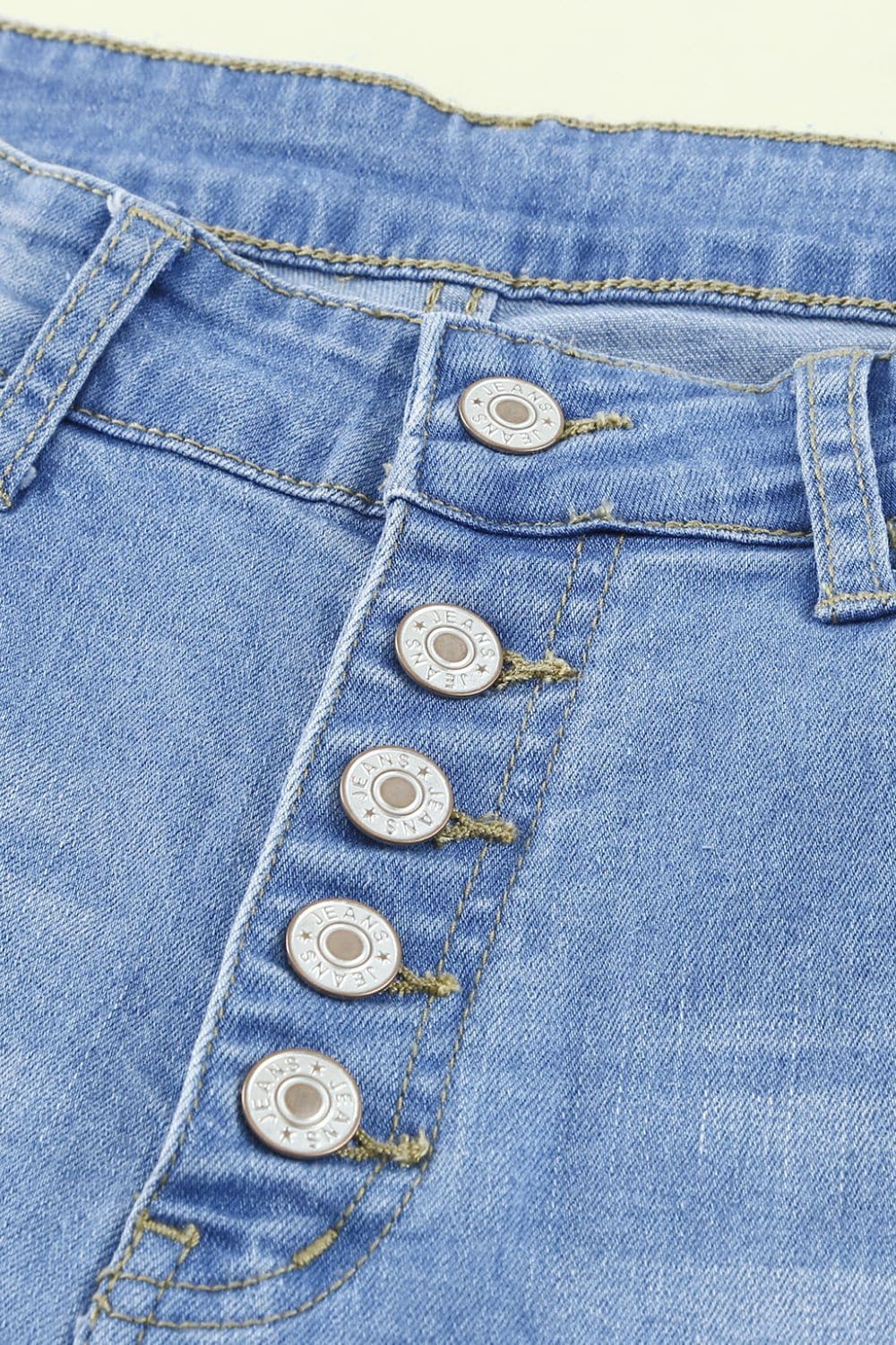 Button-Fly Distressed Raw Hem Flare Jeans.