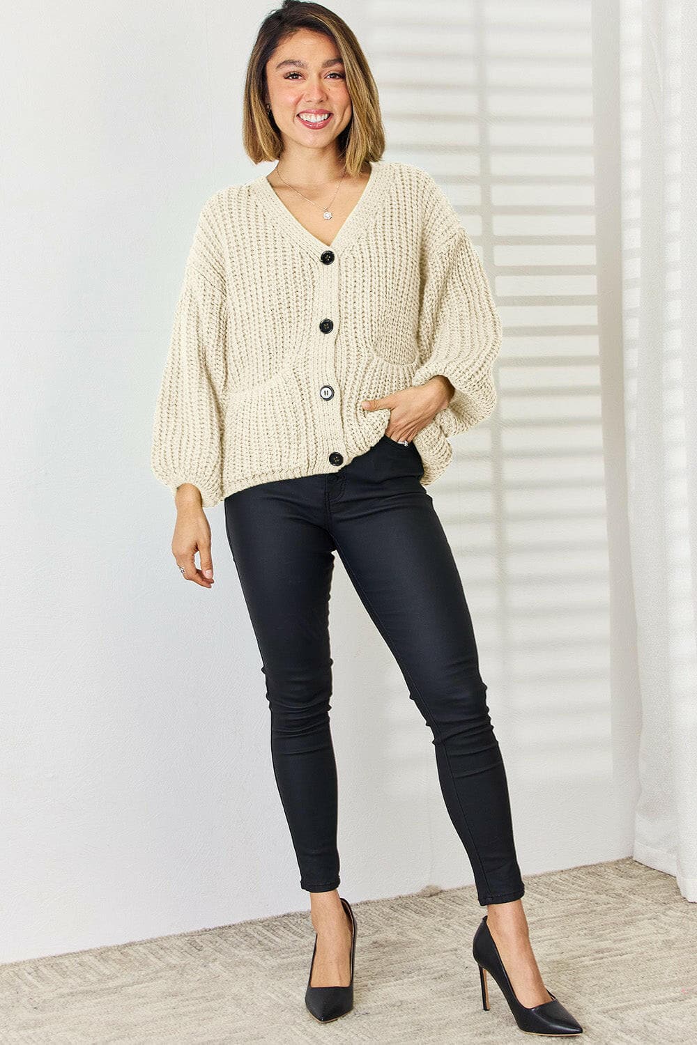 Pocketed Button Up Dropped Shoulder Cardigan.