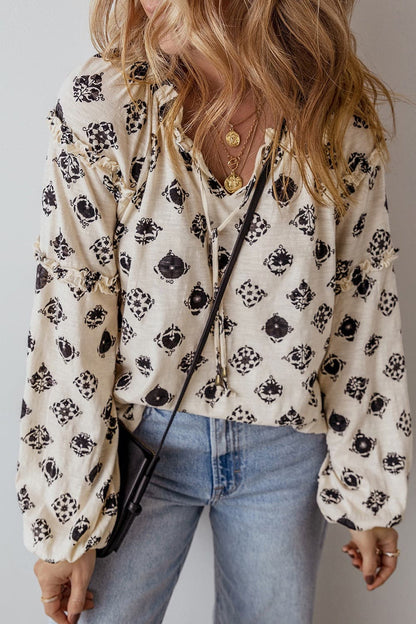 Frill Printed Tie Neck Long Sleeve Blouse.