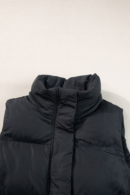 Stylish black longline windproof puffer vest with convenient pockets