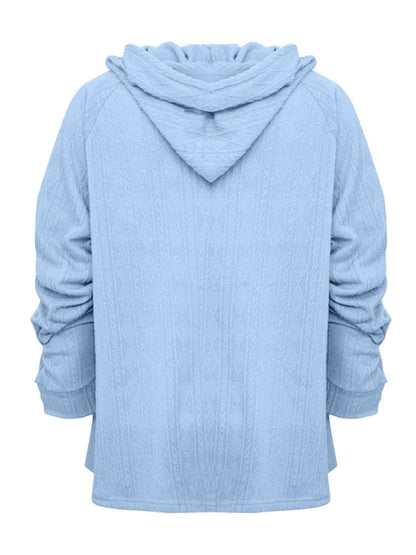 Cozy pocketed sheer hoodie with drawstring and long sleeves