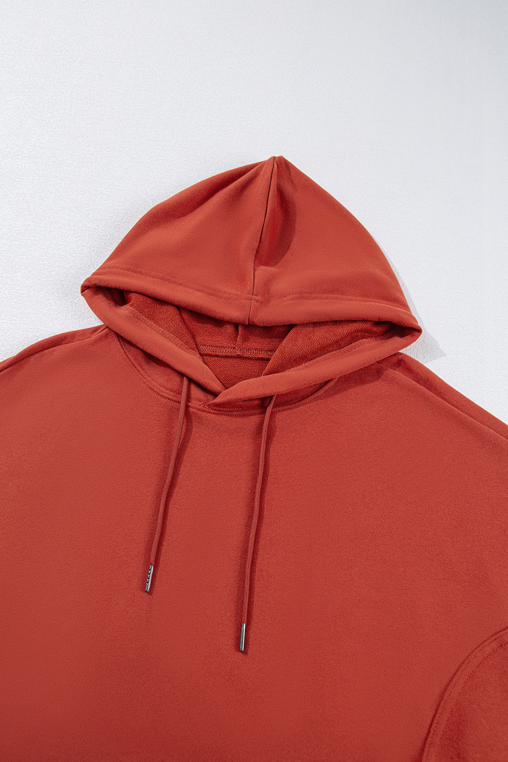 Cozy red clay oversized drawstring hoodie with pockets