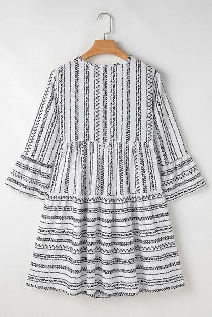 Chic printed tie neck mini dress with three-quarter sleeves