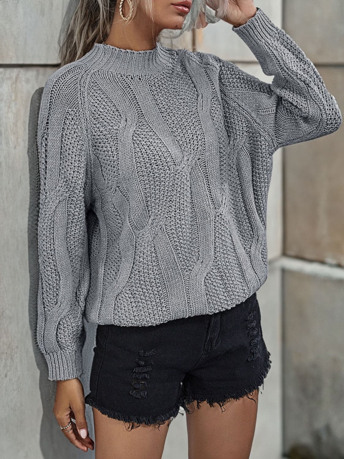 Rib-Knit Mock Neck Sweater.