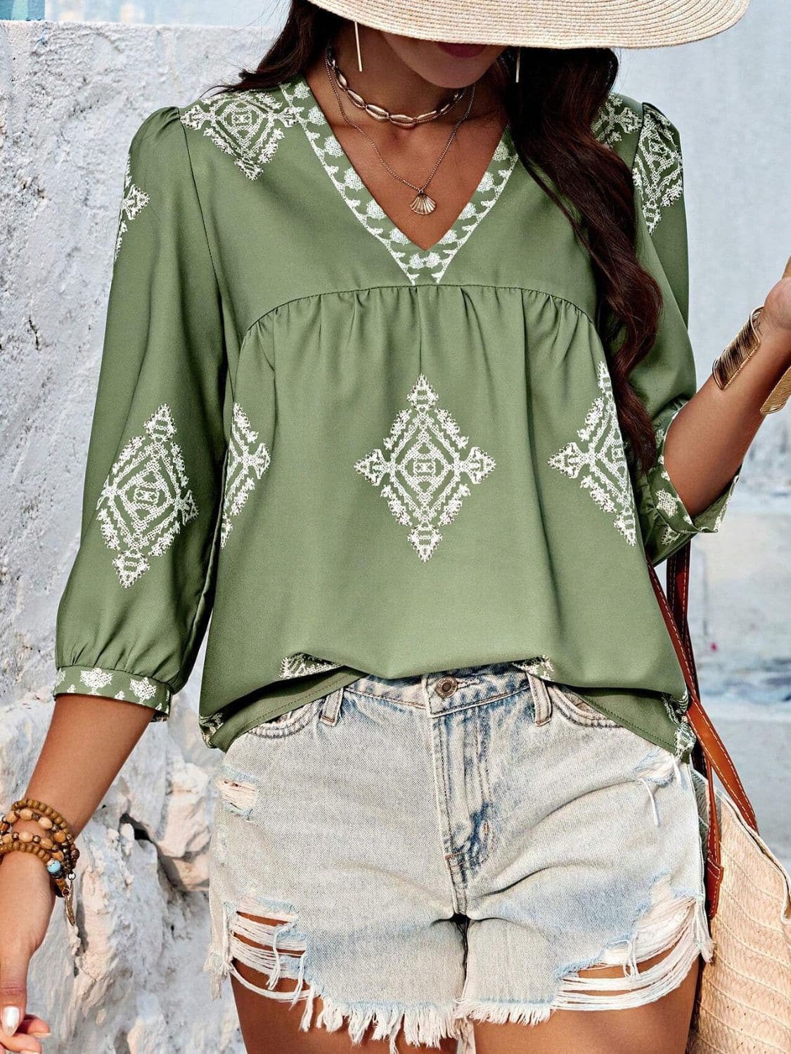 Printed V-Neck Three-Quarter Sleeve Blouse.