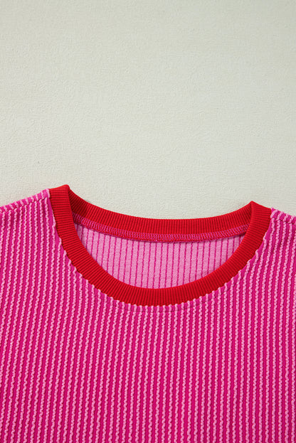 Vibrant pink corded edge drop shoulder long sleeve top