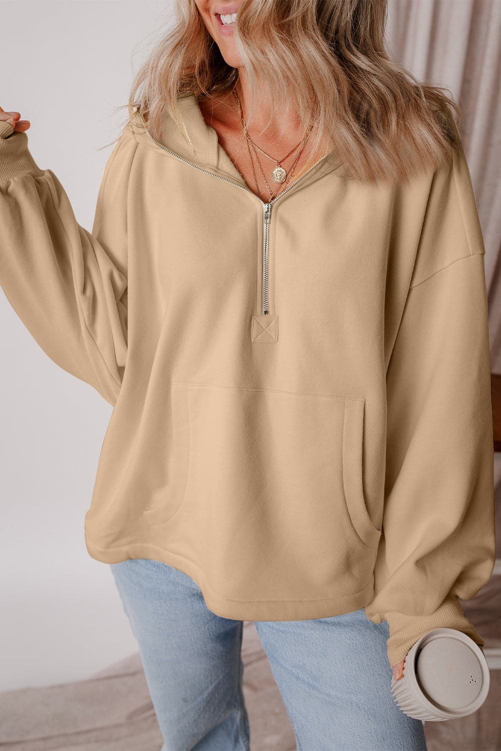 Pocketed Half Zip Dropped Shoulder Hoodie.