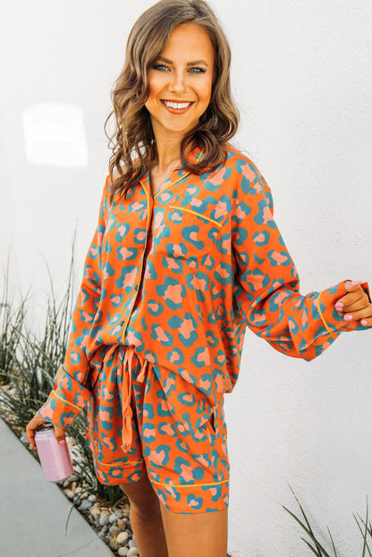 Leopard print loungewear set with long sleeves and shorts in vibrant orange