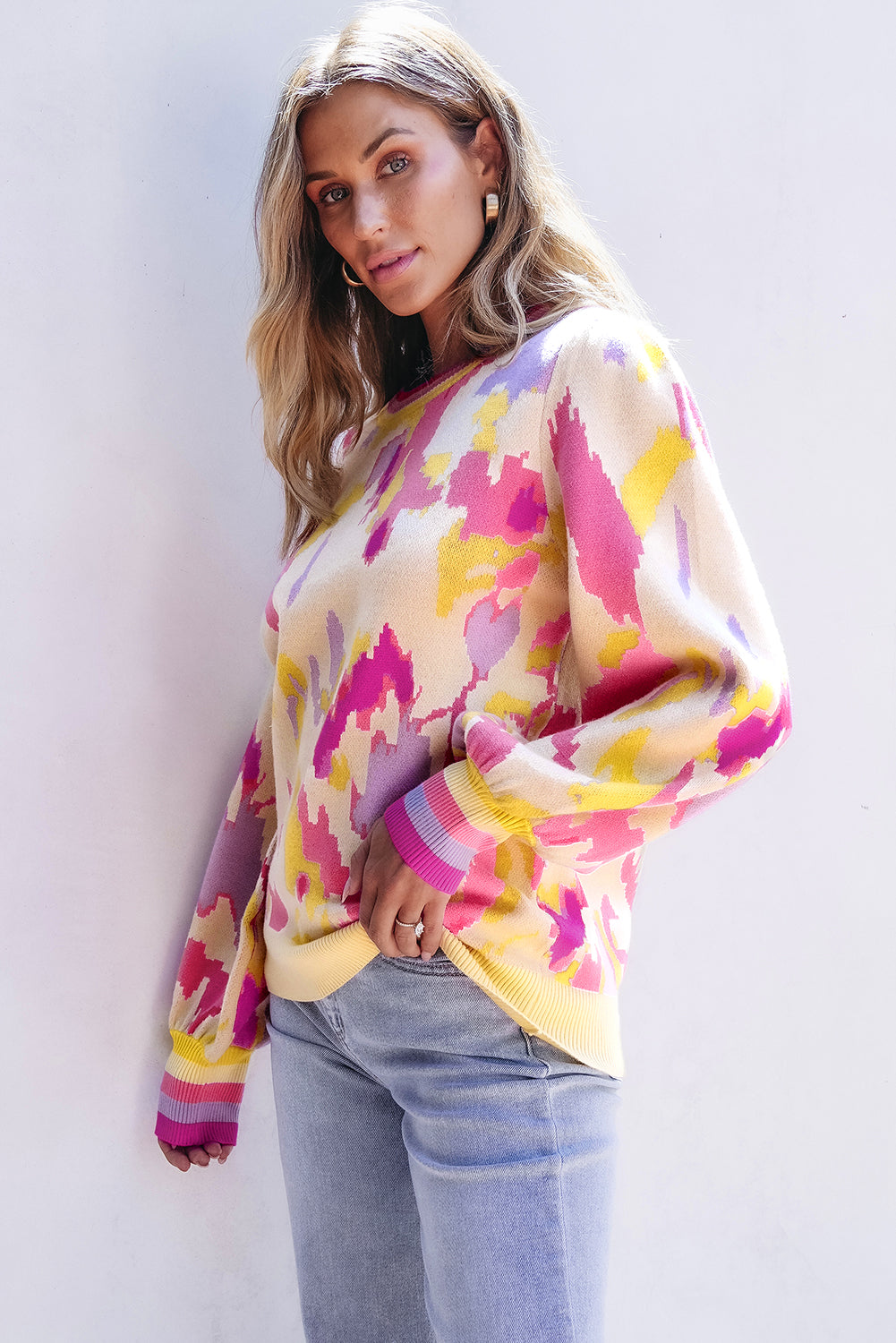 Khaki colorblock balloon sleeve sweater with vibrant abstract print