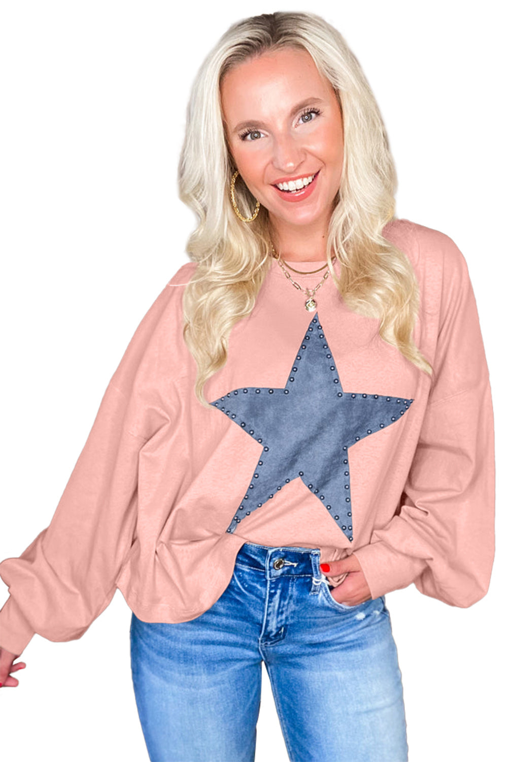 Celestial chic: Gossamer pink oversized long sleeve top with star graphic and studs