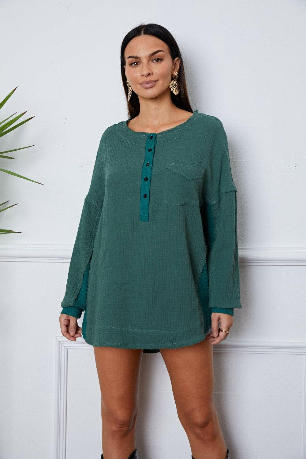 Half Button Up Round Neck BlouseHalf Button Up Round Neck Blouse
 Step up your style game with our Half Button Up Round Neck Blouse, a versatile piece that blends elegance with comfort effortlesslyLove Salve Round Neck BlouseBlouses