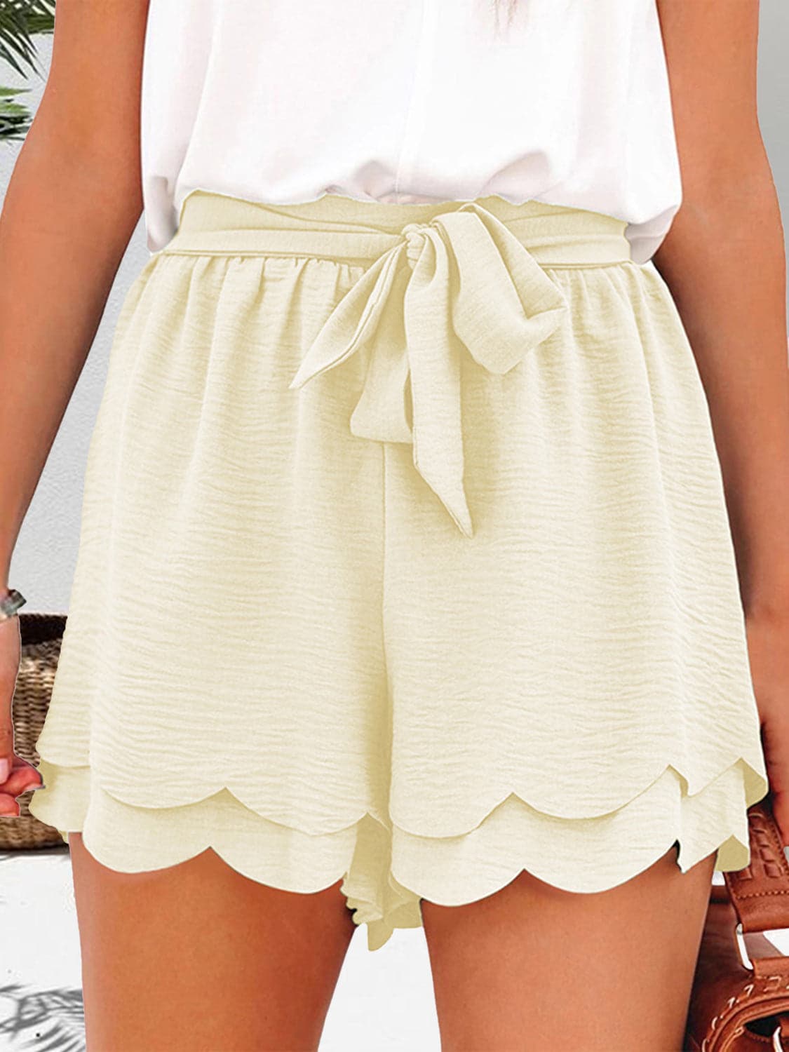 Tied Layered Scalloped Hem Shorts.