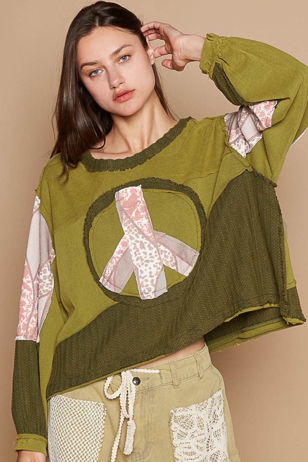 POL Long Sleeve Cut Sew Peace Emblem Top.