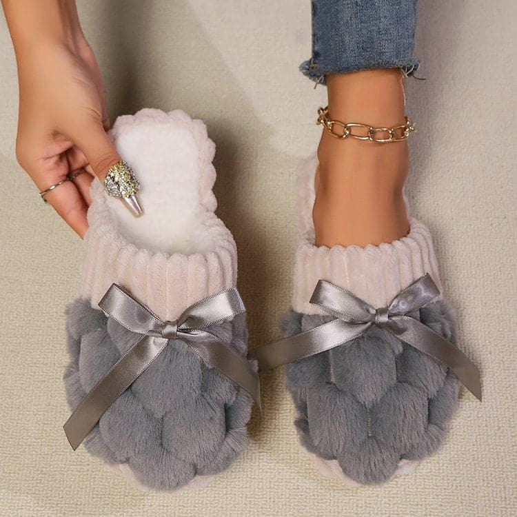 Chic bow-accented contrast slippers