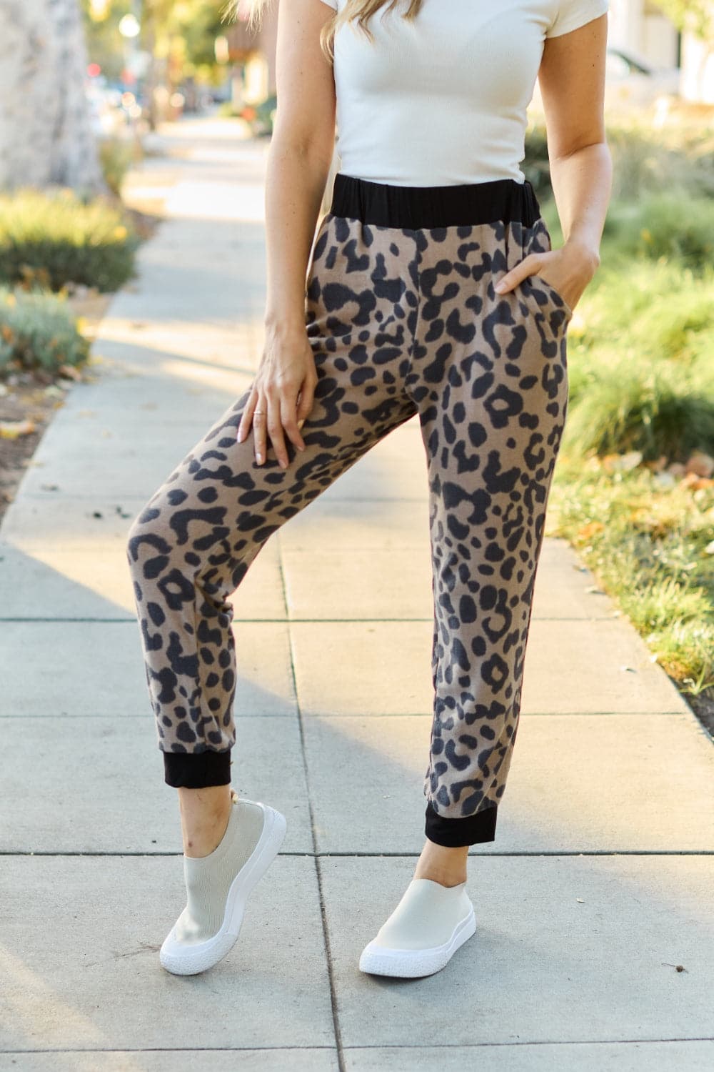 Celeste Design Full Size Leopard Contrast Sweatpants.