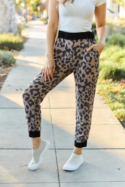 Celeste Design Full Size Leopard Contrast Sweatpants.