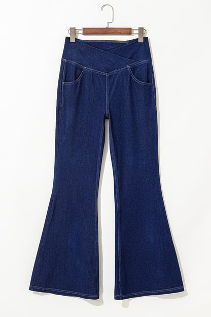 Dusk blue elastic flare jeans with crossed waist design