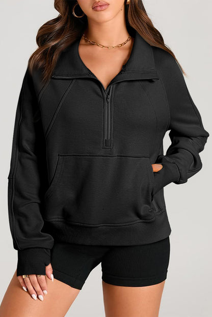 Chic black quarter zip sweatshirt with kangaroo pocket