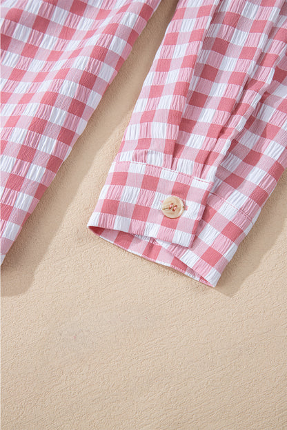 Chic pink gingham collared shirt with functional chest pockets