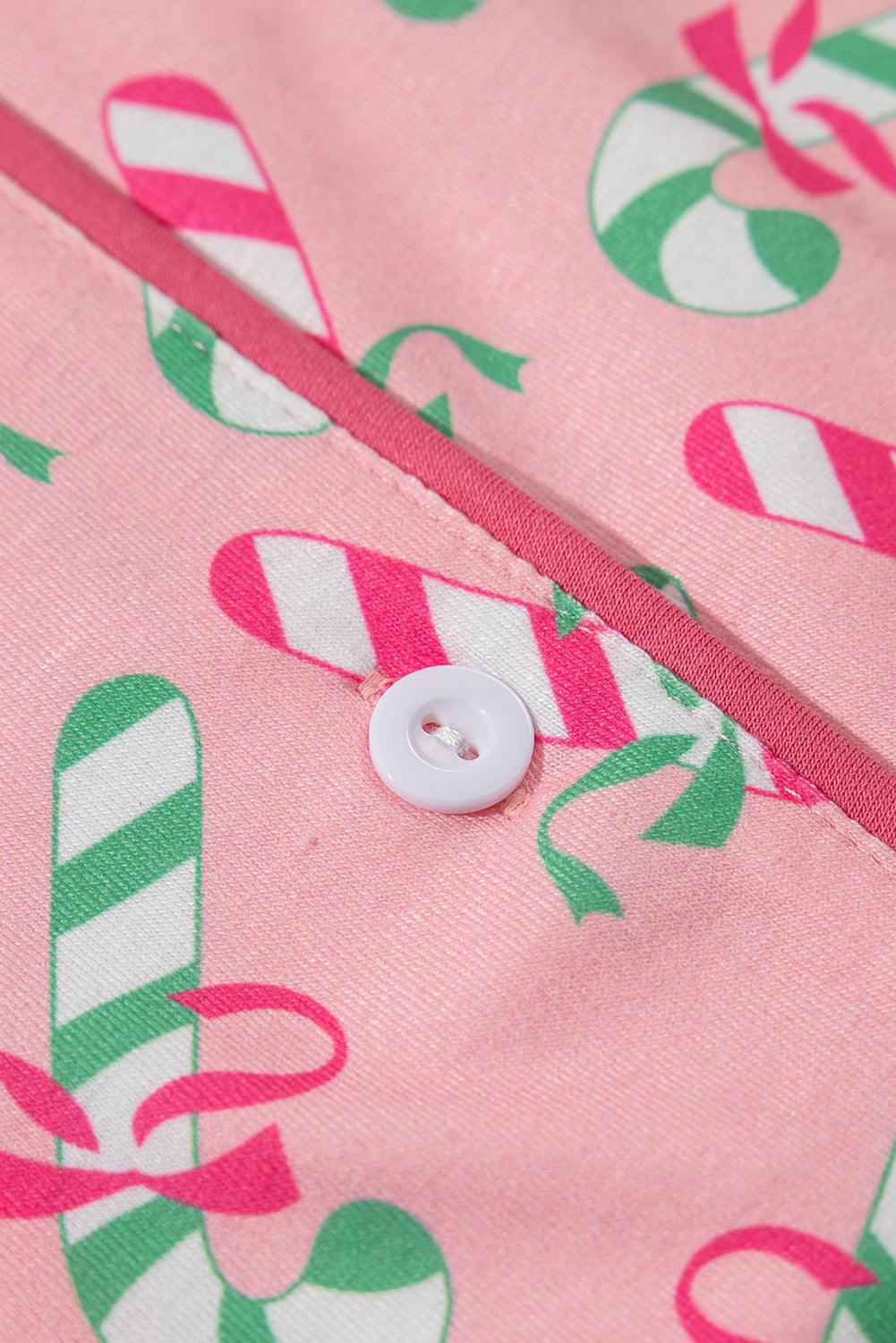 Festive pink candy cane print knotted pajama set with pockets