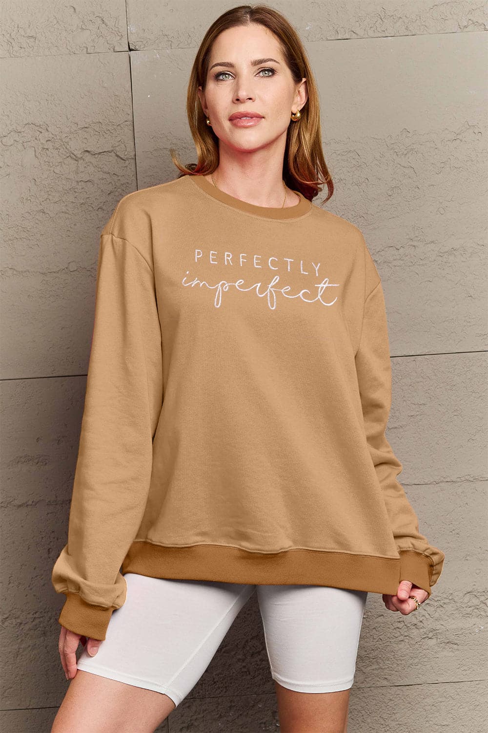 Simply Love Full Size Graphic Round Neck Sweatshirt.