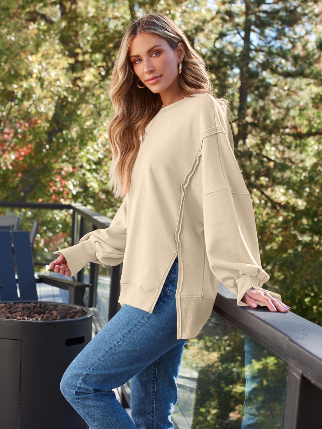 Slit Round Neck Long Sleeve Sweatshirt.