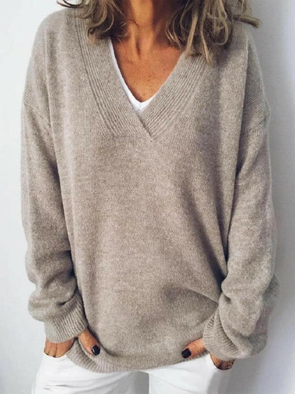 V-Neck Dropped Shoulder SweaterV-Neck Dropped Shoulder Sweater
 Upgrade your sweater collection with our V-Neck Dropped Shoulder Sweater, a perfect blend of style and comfort.
 Features:
 
 
BasicLove Salve -Neck Dropped Shoulder SweaterKnit Tops