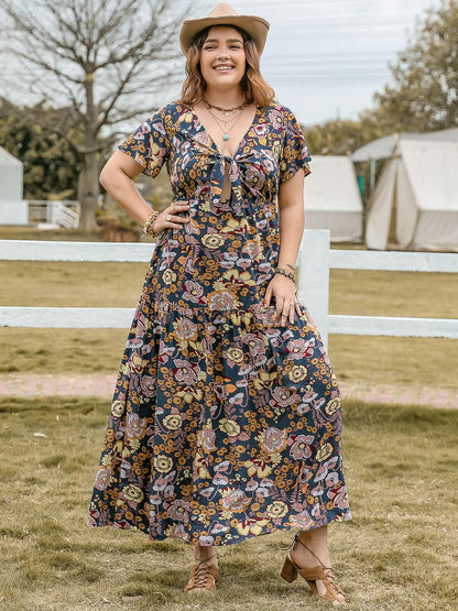 Plus Size Tied Printed Short Sleeve Midi DressPlus Size Tied Printed Short Sleeve Midi Dress
 Introducing our Plus Size Tied Printed Short Sleeve Midi Dress, the perfect blend of style and comfort for the modernLove Salve Size Tied Printed Short Sleeve Midi Dressjust arrived