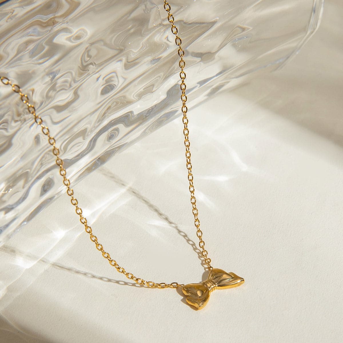 18K Gold-Plated Stainless Steel Bow Necklace.