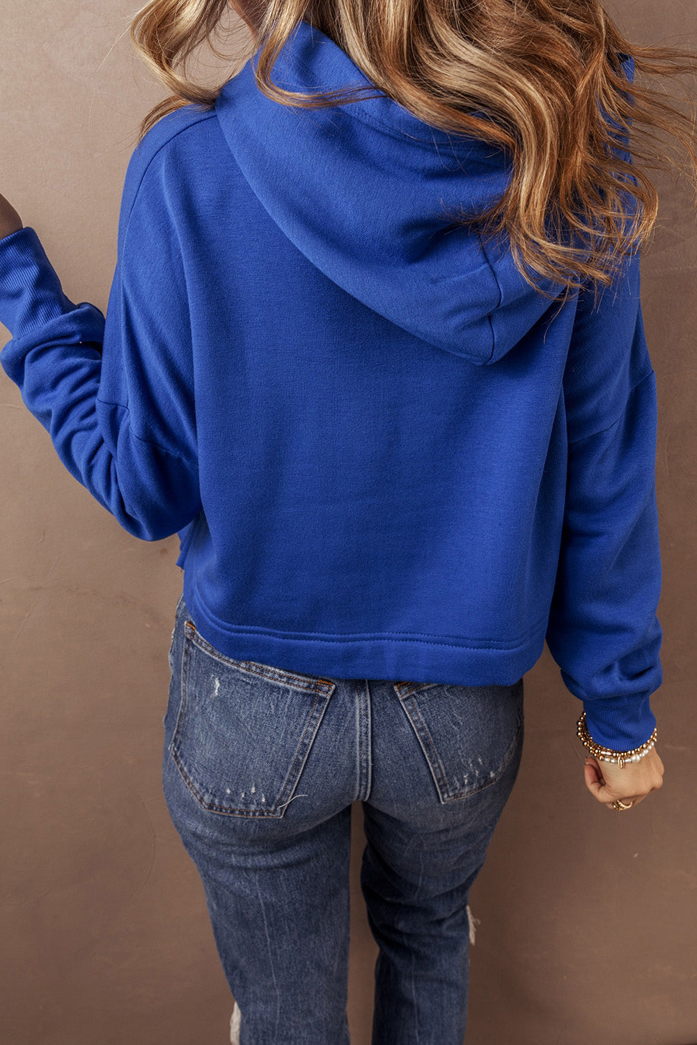 Chic dark blue cropped hoodie with drawstring hood and drop shoulder design