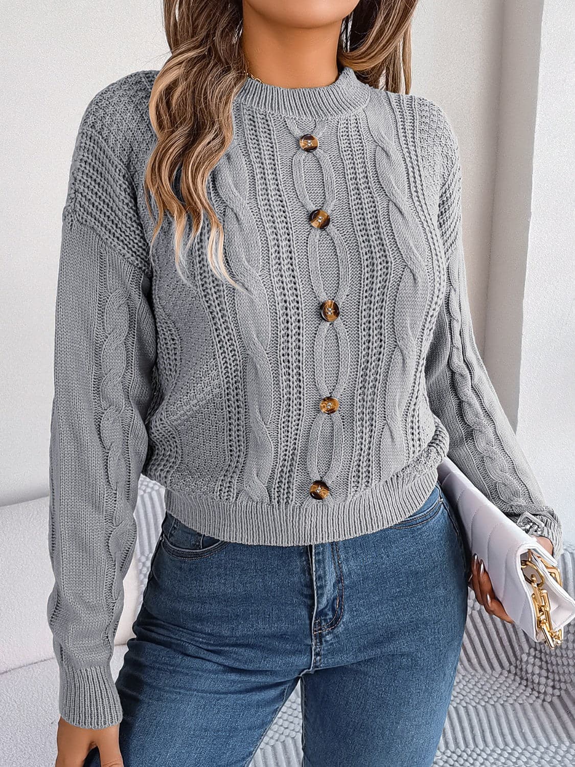 Cable-Knit Buttoned Round Neck Sweater.