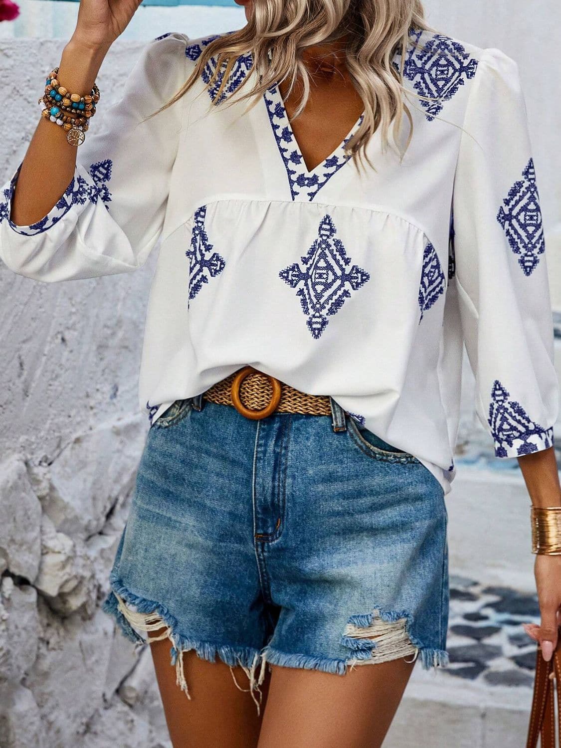 Printed V-Neck Three-Quarter Sleeve Blouse.