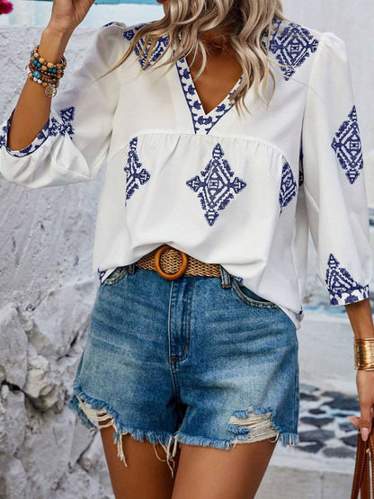 Printed V-Neck Three-Quarter Sleeve Blouse.