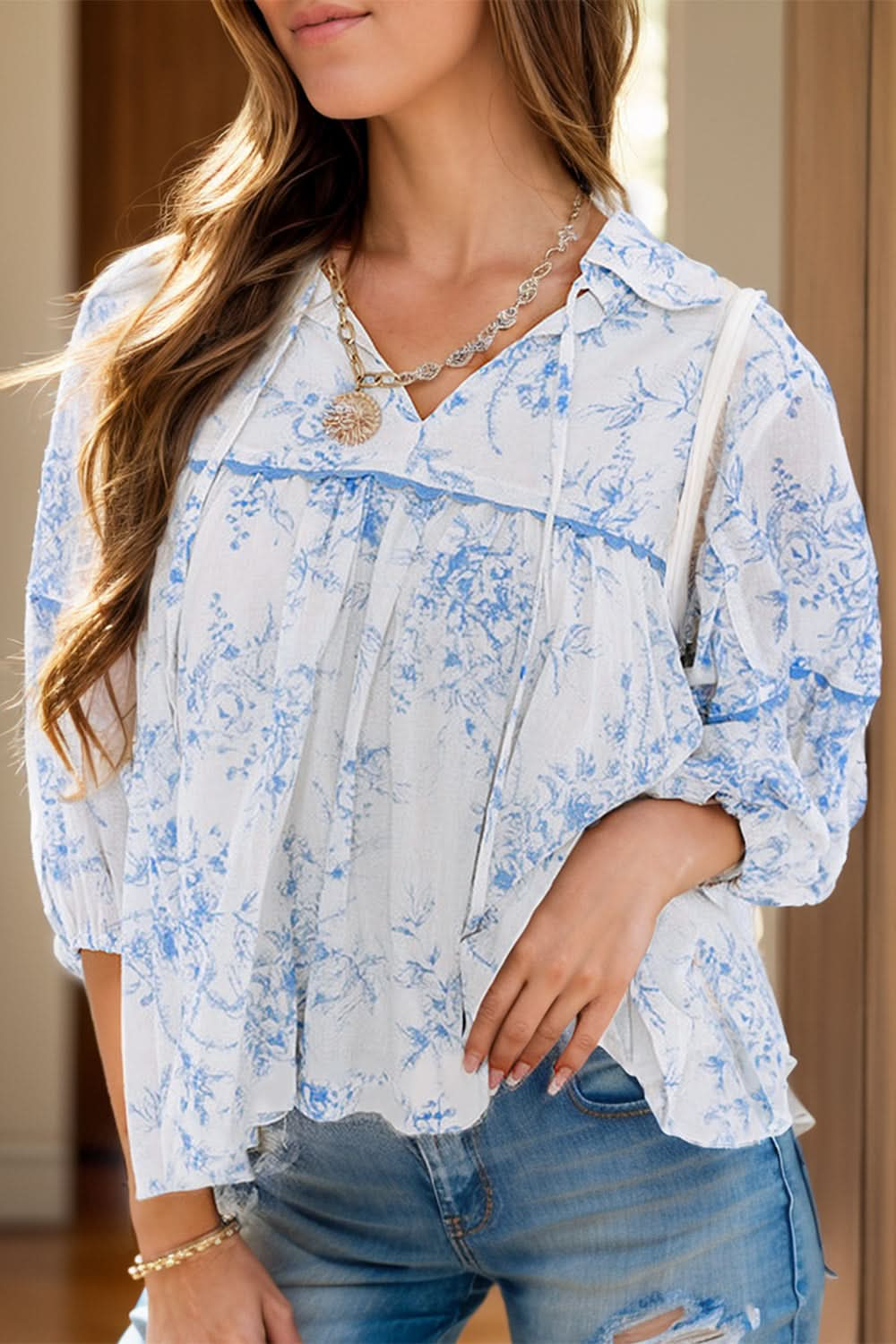 Chic printed tie neck blouse with three-quarter sleeves