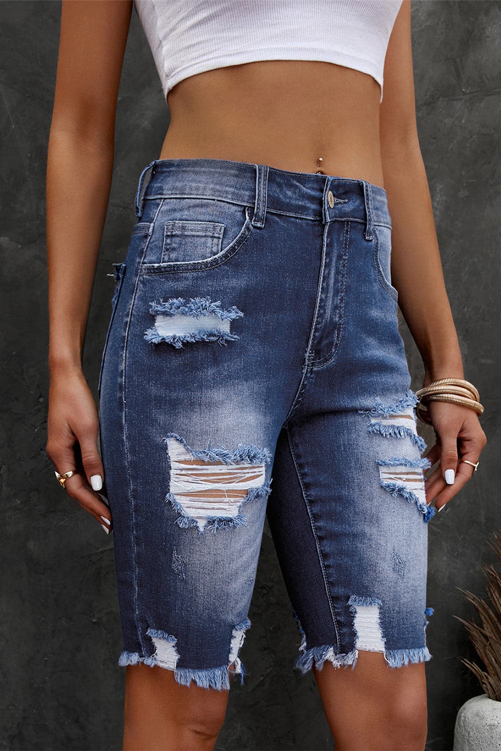 Distressed Frayed Hem Denim Bermuda Shorts.