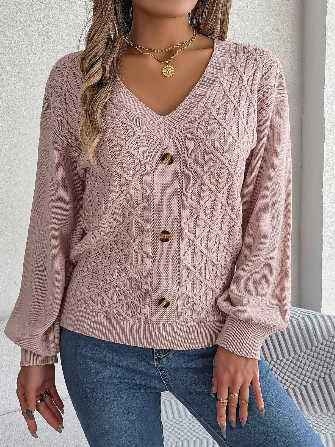 Cable-Knit V-Neck Lantern Sleeve Sweater.